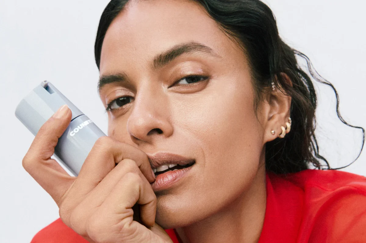 woman holding Counter skincare product