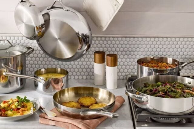 Figmint stainless steel cookware set on stove and counter