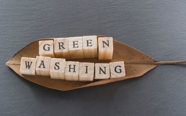 blocks spelling out greenwashing