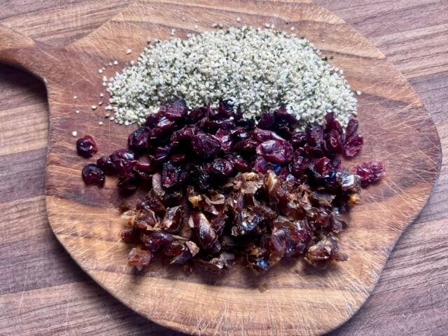 granola ingredients - dried fruit (crasins and dates) and hemp hearts superfoods