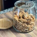 homemade granola in glass jar on counter