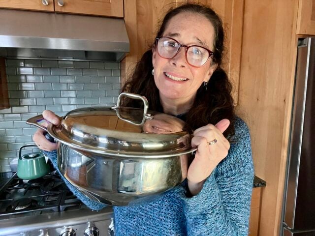 Mindful Momma holding 360 Cookware