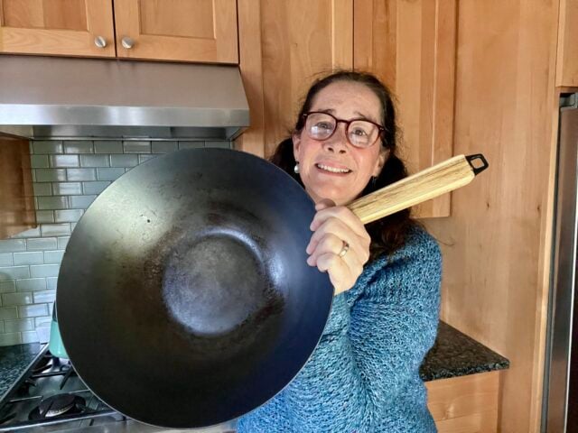 Mindful Momma holding Alva Carbon Steel Wok