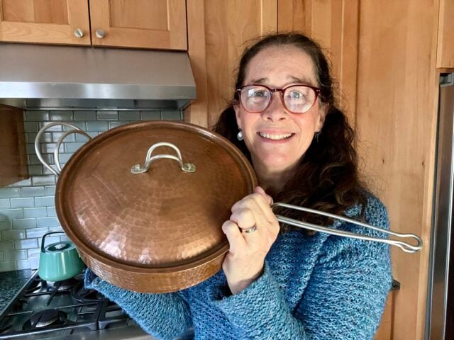 Mindful Momma holding Sertodo copper pan