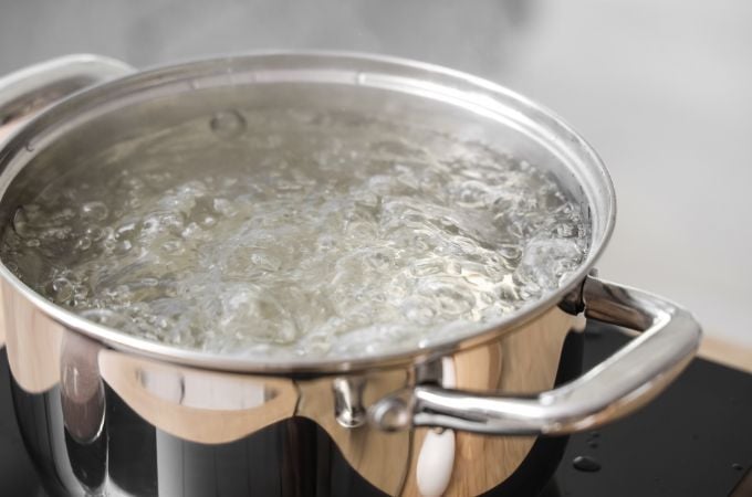 stainless steel pan with boiling water